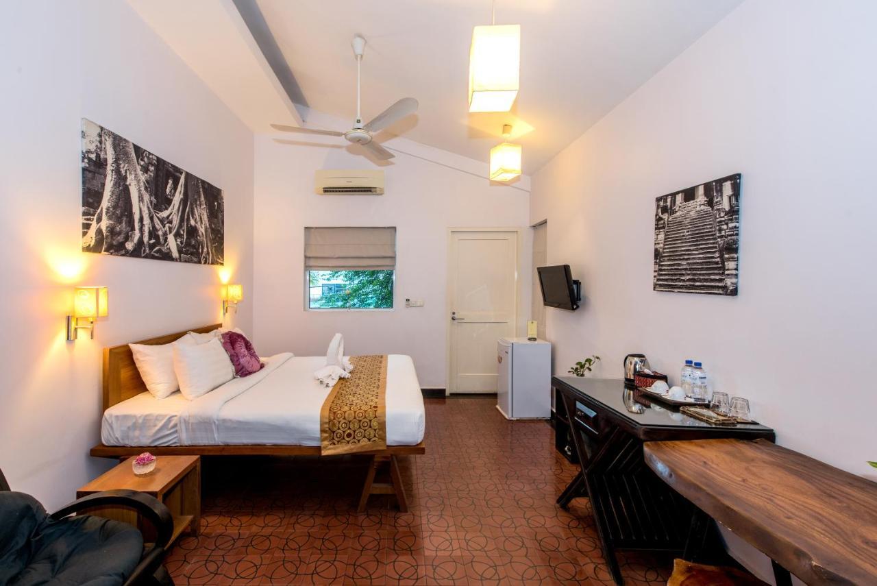 Comoda Casa Hotel シェムリアップ エクステリア 写真